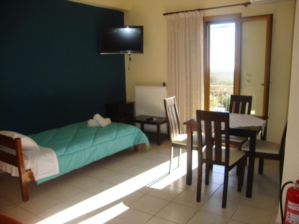 Kafiona Guesthouse Pírgos Dhiroú Rom bilde